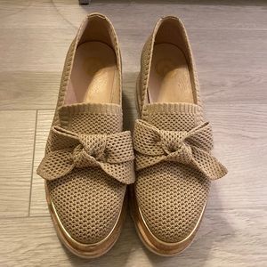 The wishbone platform shoes, gold